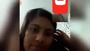 Young Indian woman shows off her XXX tits for online fan on phone camera