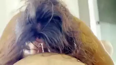 Tattooed MILF gives blowjob and boob job to lover