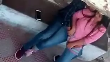 Tempting Desi girl allows sex partner to touch her XXX vagina outdoors