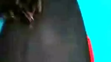 Desi female in a long black skirt exposes legs and boobies in sex show