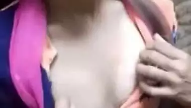 Adorable Desi cutie flashes curious friend her XXX tits in public