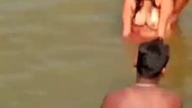 XXX video of Desi girl who flirts with a bunch of guys in a river