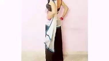 Sexy young indian girl teaching how to wear...