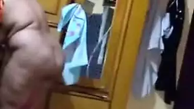 Cunning guy films fat Desi woman walking around room without XXX clothes