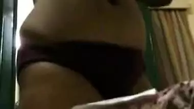 Desi MILF nude boobs and tits while changing clothes