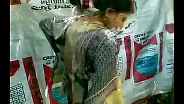 Sexy village teen taking bath in an open place