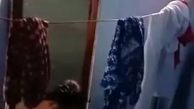 Amateur voyeur XXX camera catches sexy Desi babe taking a shower