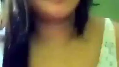 Cute girl opens bra to show sexy boobs to lover