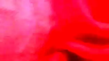 Playing with the hot boobs of aunty in red bikini